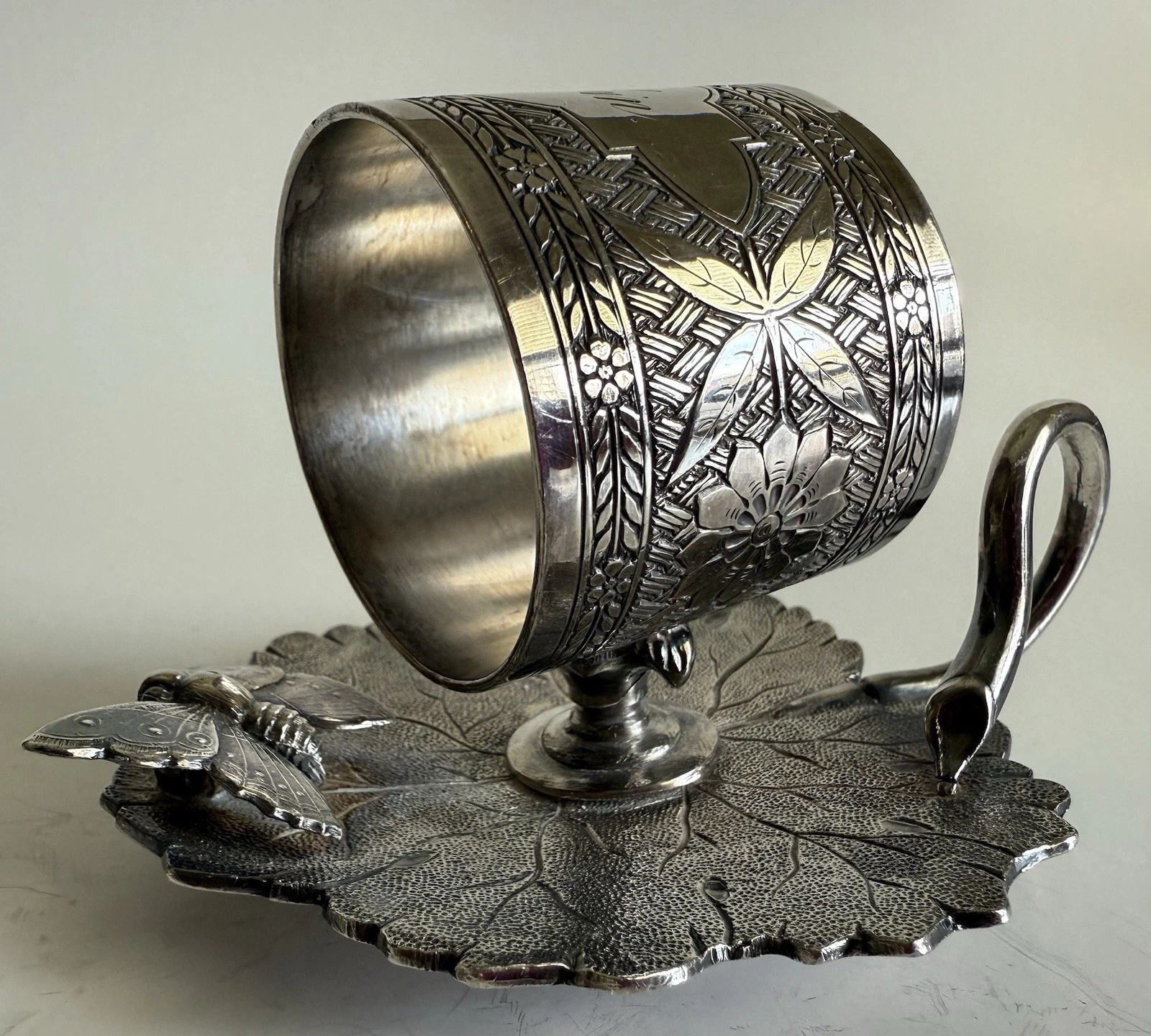 Butterfly on leaf. Tufts 1542.