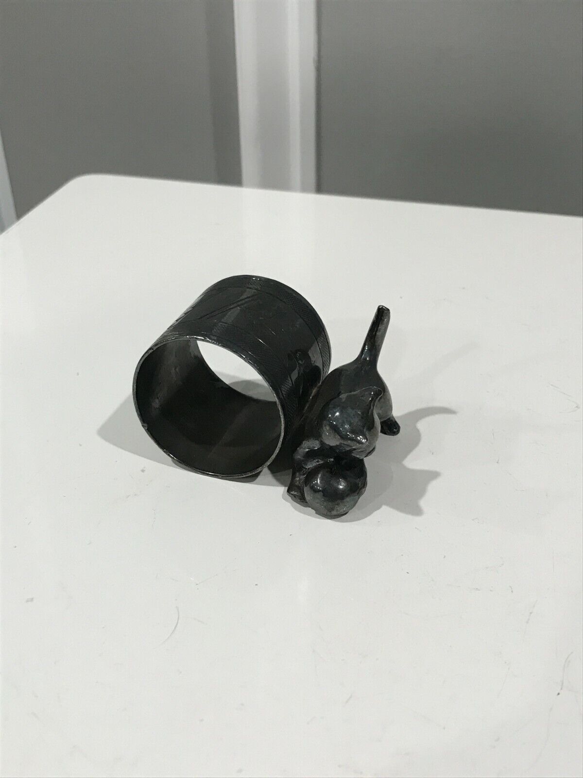 Cat playing with a ball, unmarked.