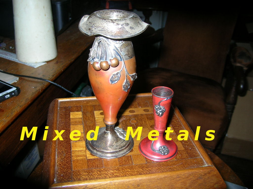 Mixed metal figurals