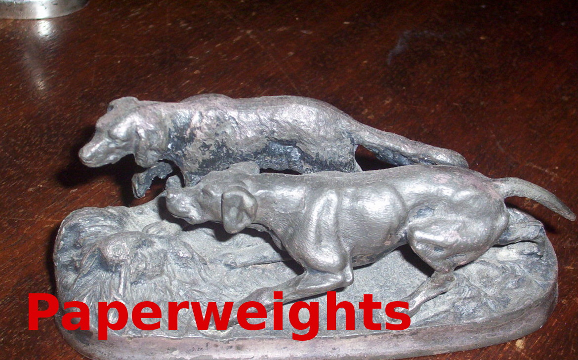 Figural paperweights